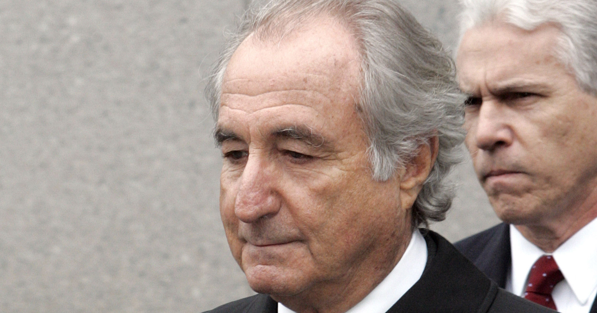 In this March 10, 2009, file photo, former financier Bernie Madoff exits federal court in Manhattan, in New York.