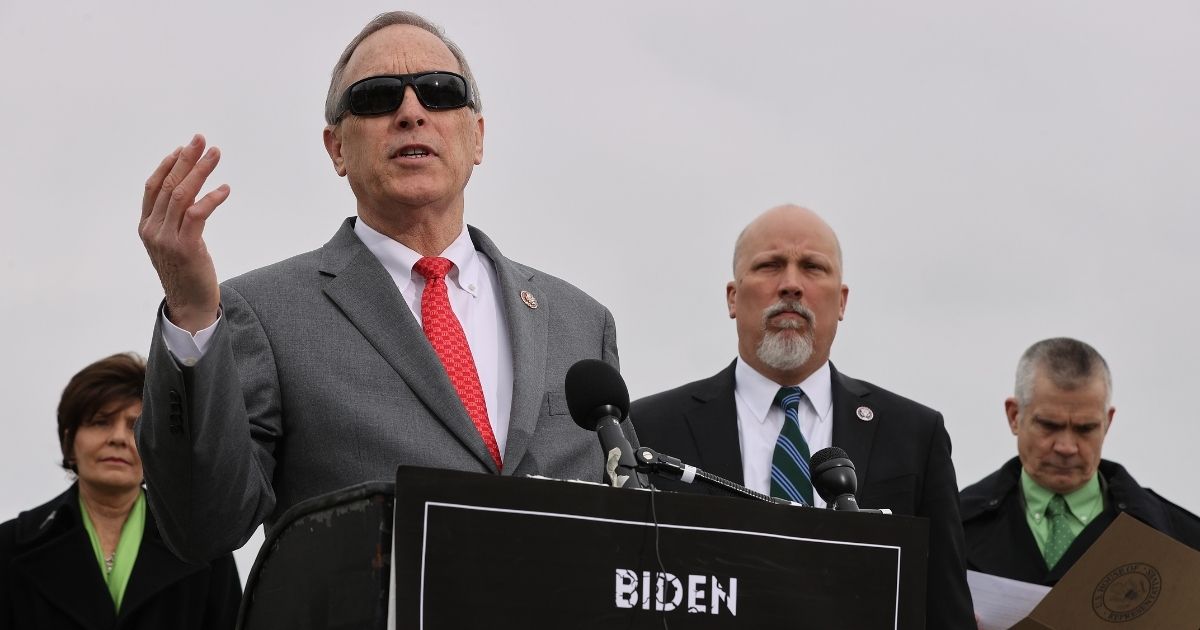 House Freedom Caucus Chairman Rep. Andy Biggs, second from left, speaks during a news conference outside the U.S. Capitol on March 17, 2021, in Washington, D.C.