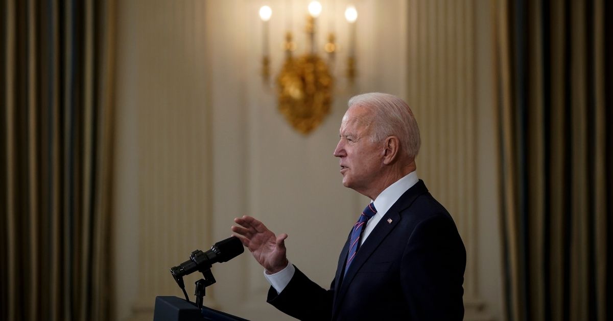 President Joe Biden speaks about the March jobs report in the State Dining Room of the White House on April 2 in Washington, D.C.