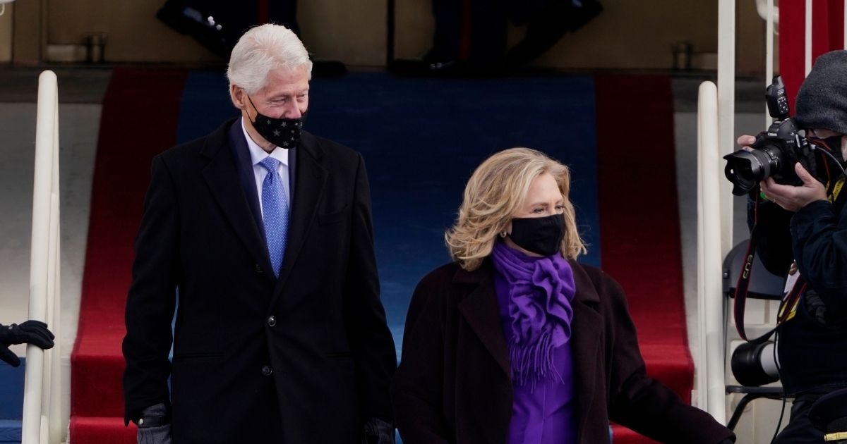 Former President Bill Clinton and his wife former Secretary of State Hillary Clinton arrive for the 59th inaugural ceremony on the West Front of the U.S. Capitol on Jan. 20 in Washington, D.C.