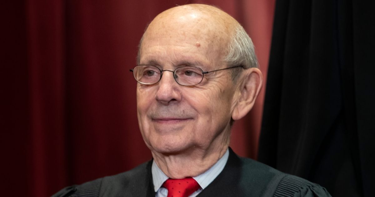 Associate Justice Stephen Breyer sits with fellow Supreme Court justices for a group portrait at the Supreme Court Building in Washington on Nov. 30, 2018.