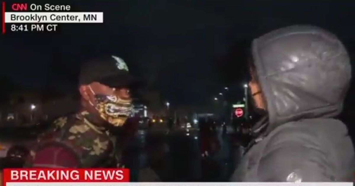 CNN reporter Sara Sidner was interrupted by a protester on Monday night during riots in Minneapolis following the shooting of Daunte Wright.