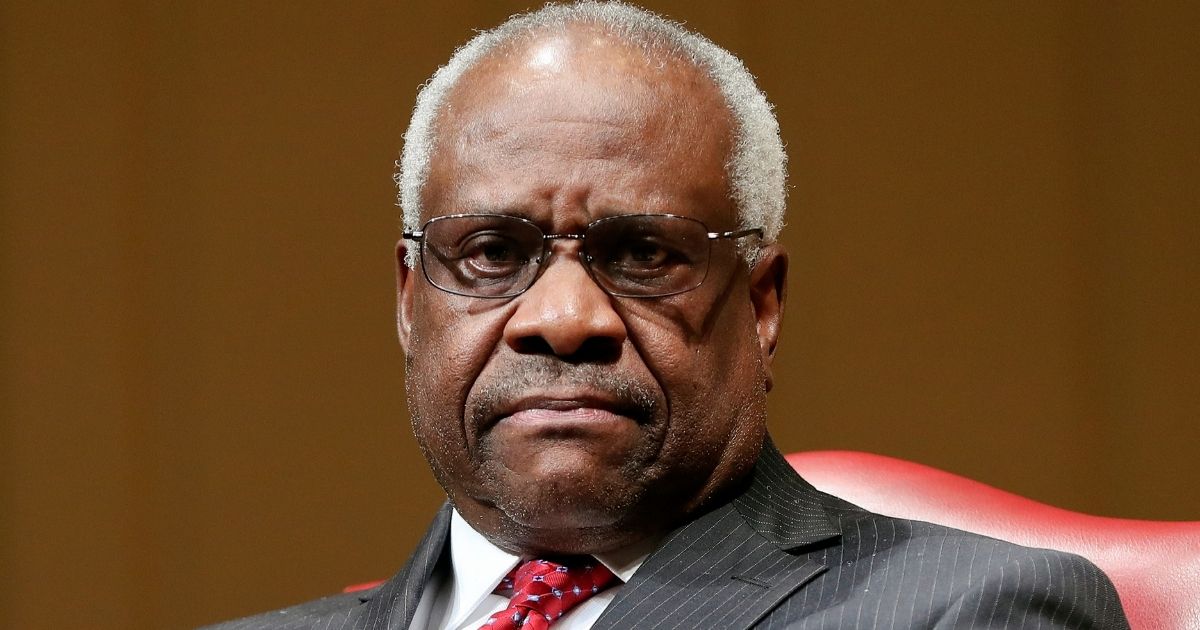 Supreme Court Justice Clarence Thomas sits as he is introduced during an event at the Library of Congress in Washington, D.C., on Feb. 15, 2018.