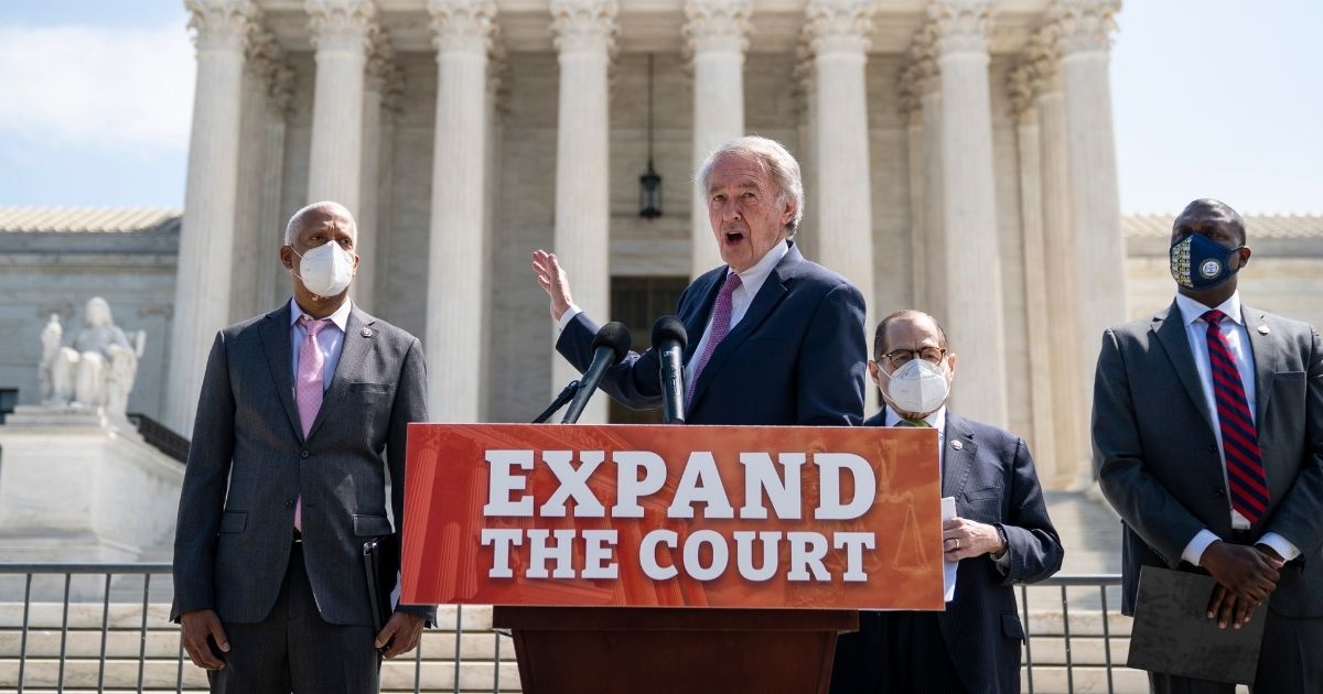Democrats including (from left to right) Georgia Rep. Hank Johnson, Massachusetts Sen. Ed Markey, House Judiciary Committee Chairman Rep. Jerrold Nadler and Rep. Mondaire Jones of New York hold a news conference in front of the U.S. Supreme Court to announce legislation to expand its number of seats on Thursday.