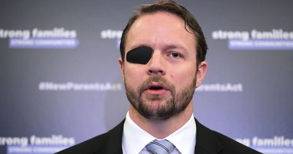 Republican Rep. Dan Crenshaw of Texas joins fellow Republicans from the House and Senate to introduce paid family leave legislation during a news conference in the Russell Senate Office Building on Capitol Hill on March 27, 2019, in Washington, D.C.