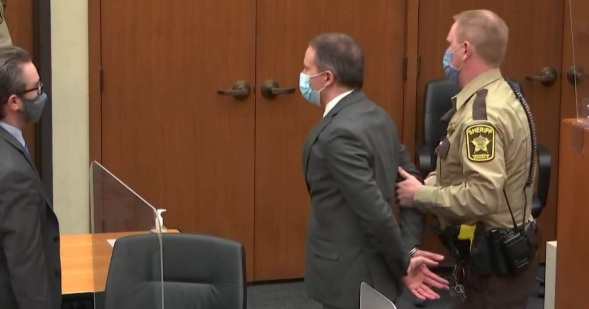Former Minneapolis police officer Derek Chauvin is led from the courtroom after his trial in the case of the death of George Floyd.