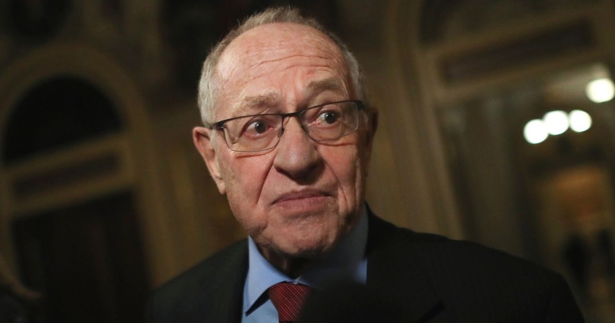 Attorney Alan Dershowitz, a member of then-President Donald Trump's legal team, speaks to the media in the Senate Reception Room during Trump's impeachment trial at the U.S. Capitol in Washington on Jan. 29, 2020.