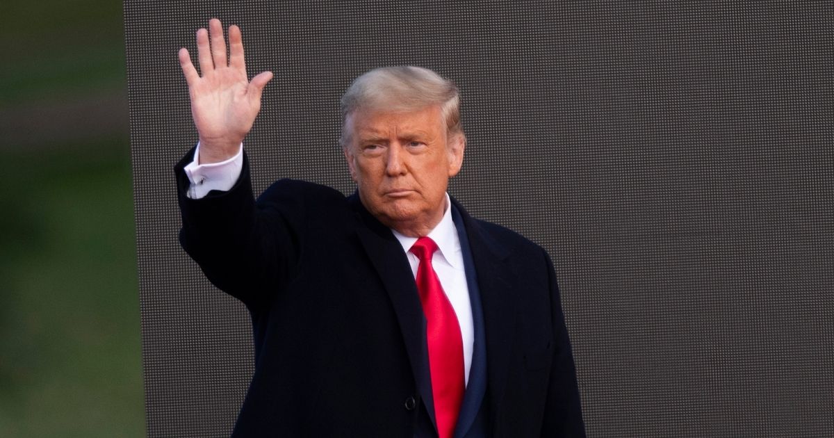 Former President Donald Trump acknowledges supporters after holding a campaign rally on Oct. 31, 2020, in Newtown, Pennsylvania.