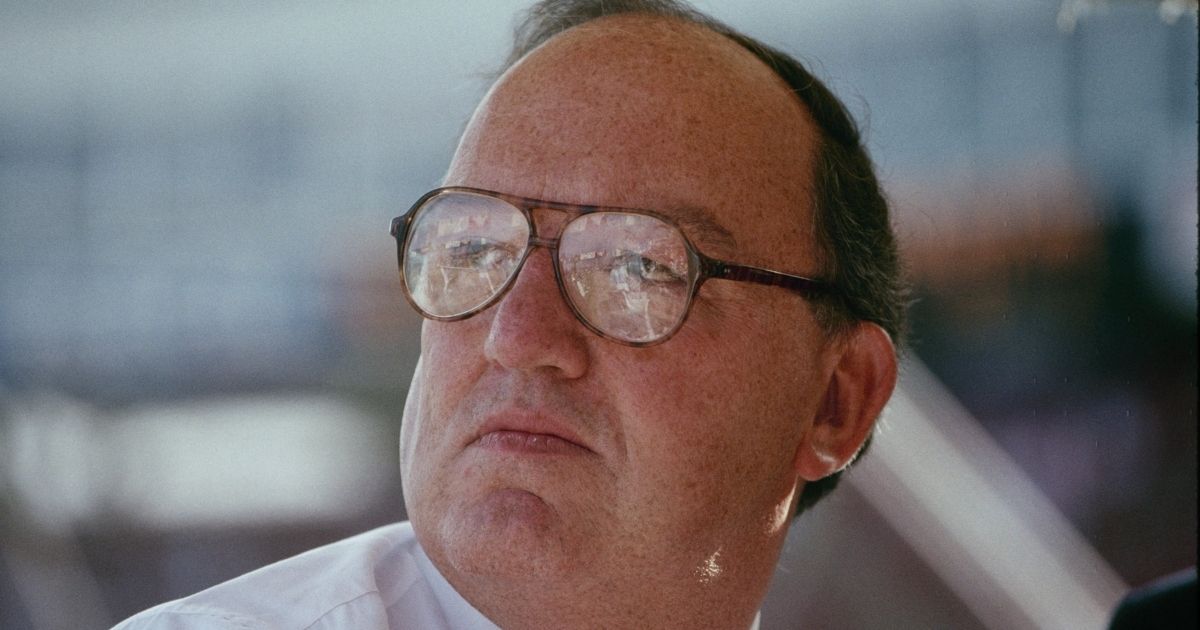 Then-MLB Commissioner Fay Vincent looks on during a July 1990 Texas Rangers game at Arlington Stadium.