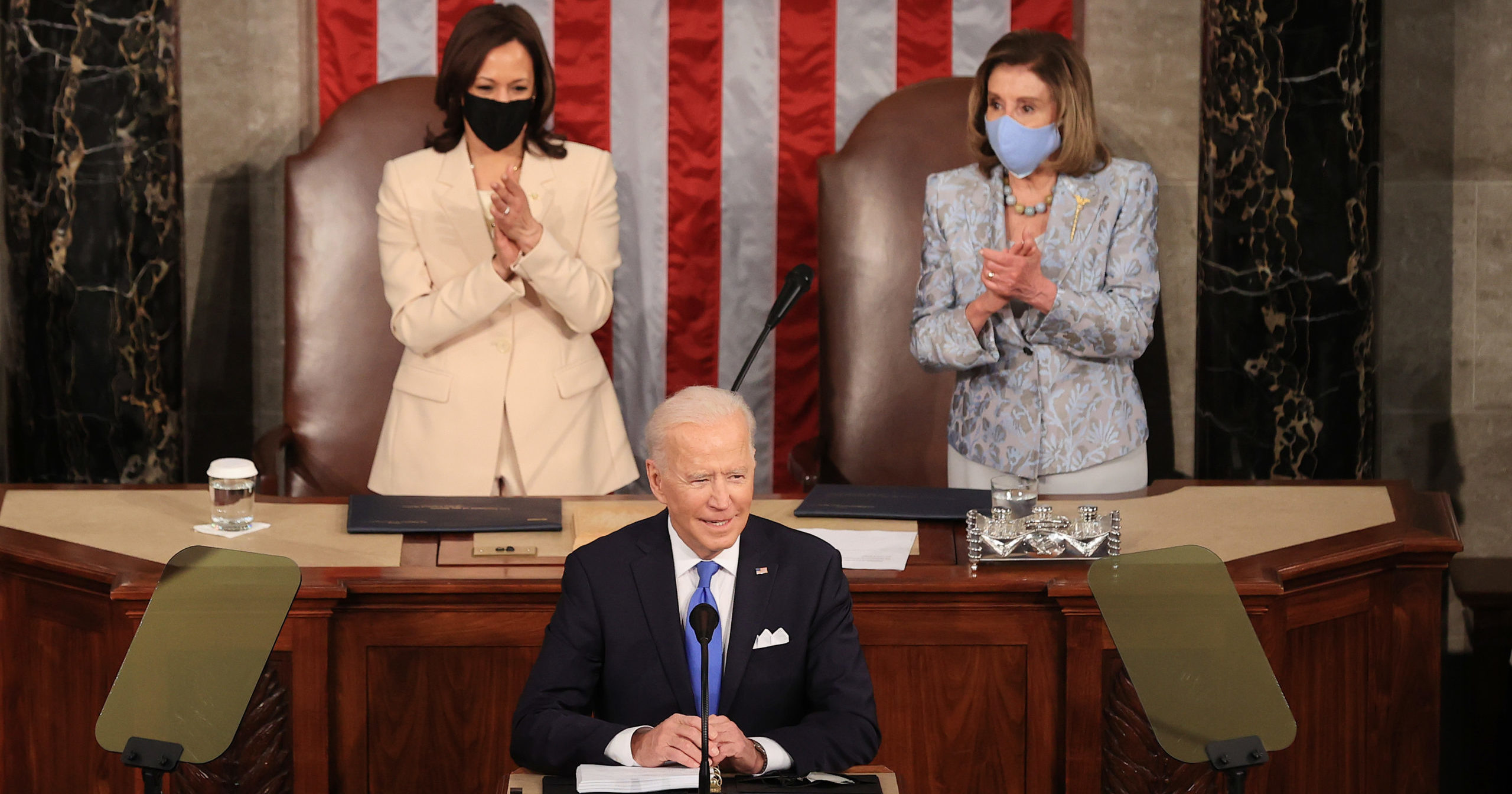 President Joe Biden addresses a joint session of Congress as Vice President Kamala Harris, left, and Democratic Speaker of the House Nancy Pelosi, right, look on in the House chamber of the U.S. Capitol on Wednesday in Washington, D.C.