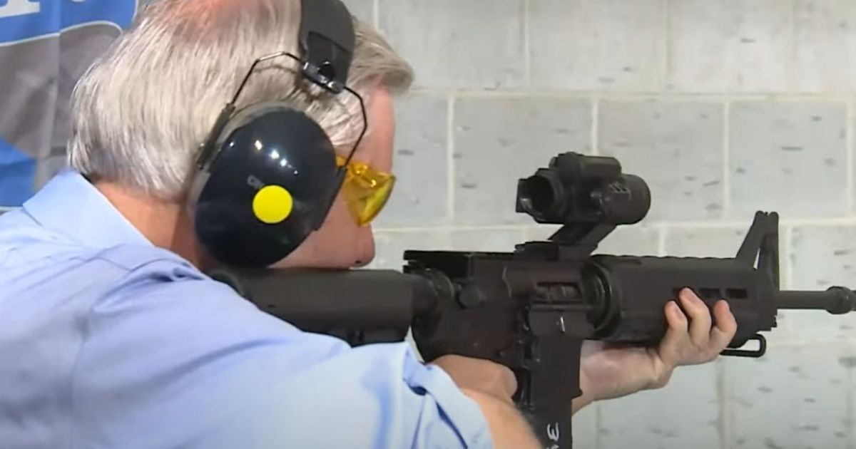 South Carolina Sen. Lindsey Graham fires a rifle during a visit to a shooting range in Greenville.