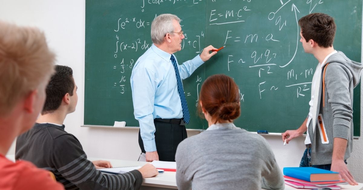 A high school math teacher is pictured in the stock image above.