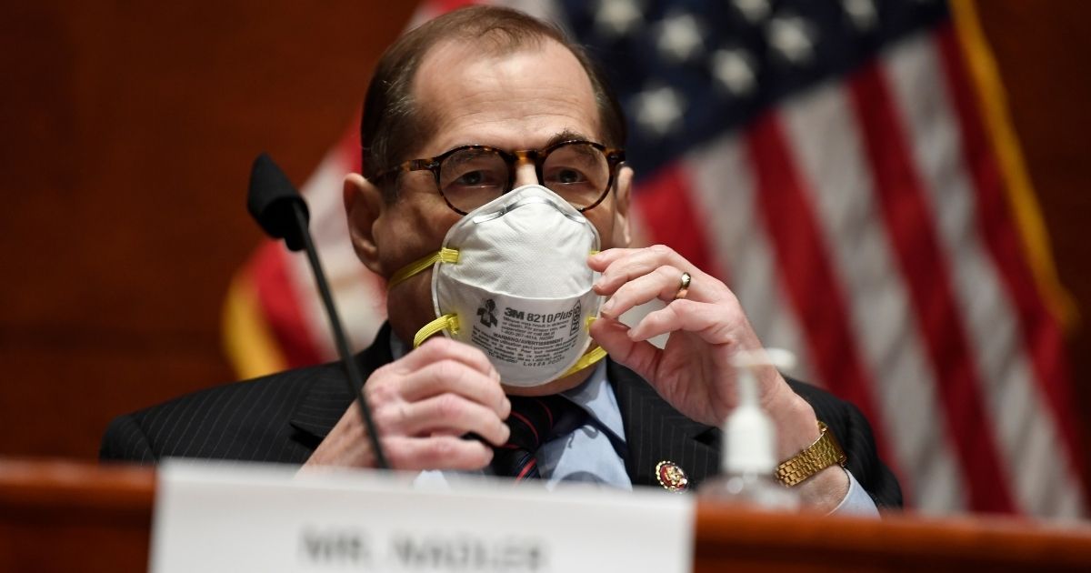 House Judiciary Committee Chairman Rep. Jerrold Nadler adjusts his face mask during a hearing on Capitol Hill, June 24, 2020, in Washington, D.C