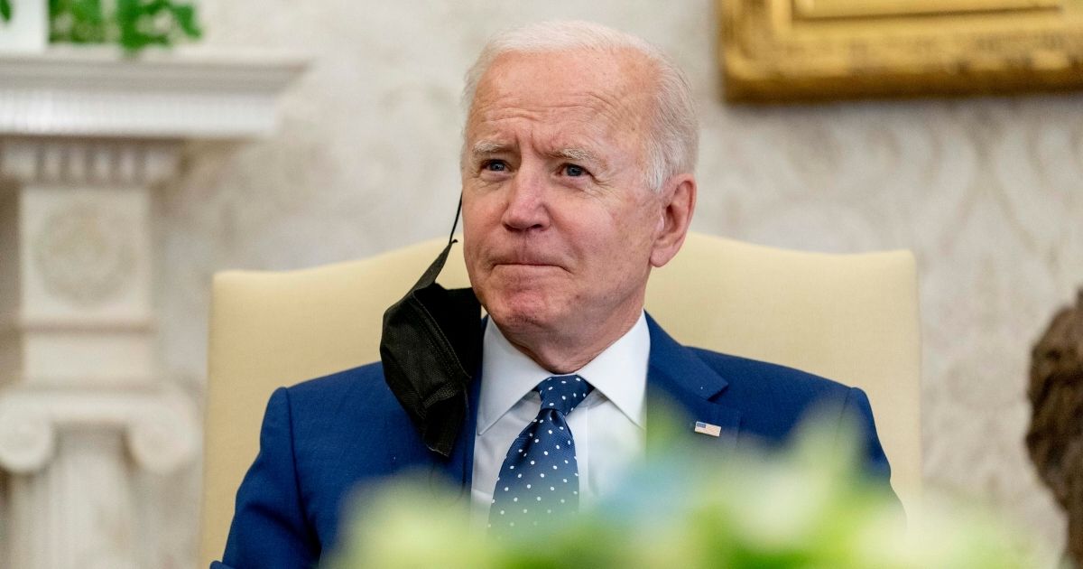 President Joe Biden pauses while speaking during a meeting with members of the Congressional Asian Pacific American Caucus Executive Committee at the White House in Washington on April 15, 2021.