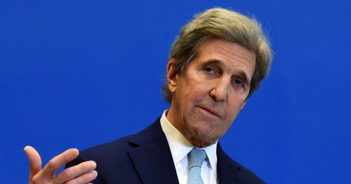Special Presidential Envoy for Climate John Kerry gestures as he addresses a news conference in Paris on March 10, 2021.