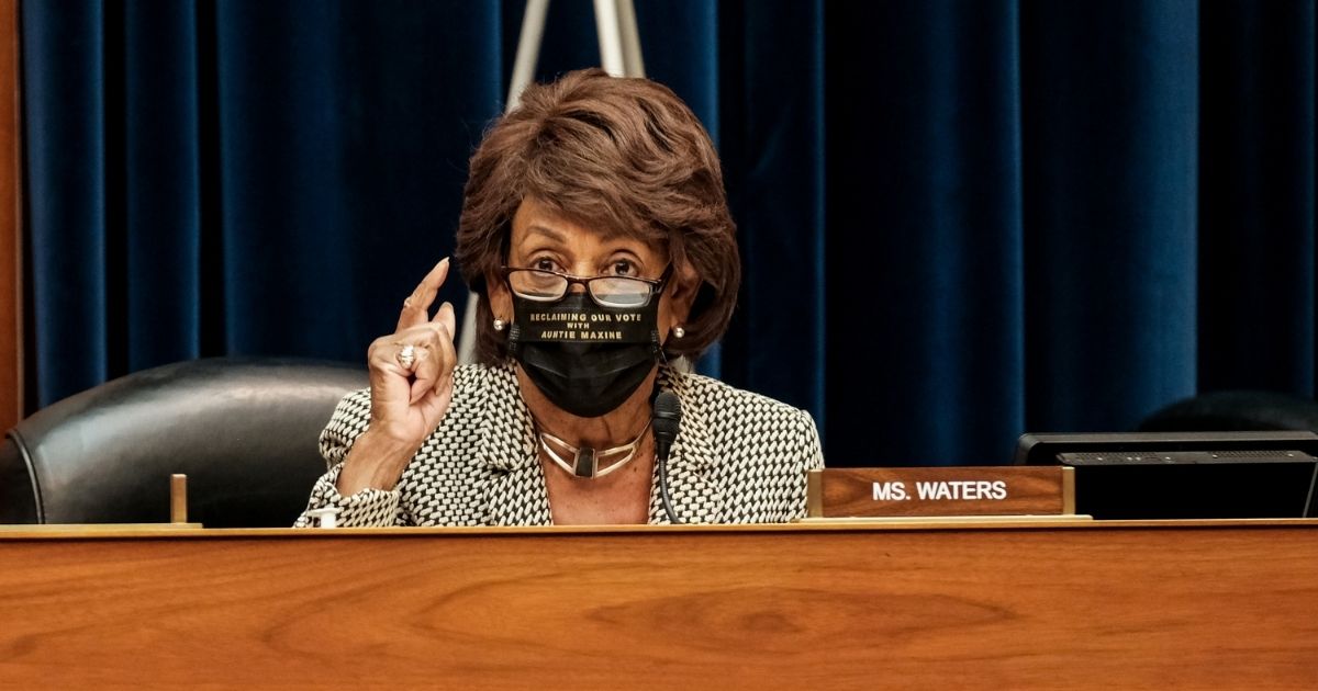 Democratic Rep. Maxine Waters of California listens to Health and Human Services Secretary Alex M. Azar at a hearing before the House Select Subcommittee on the Coronavirus Crisis in the Rayburn Building on Oct. 2, 2020, in Washington, D.C.