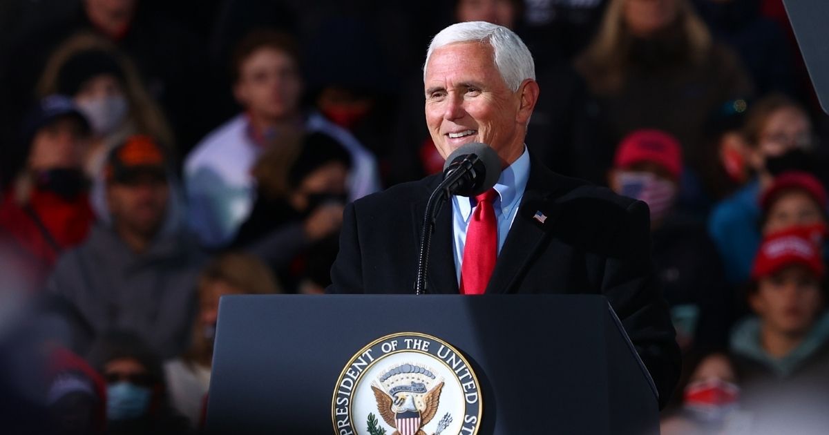 Former Vice President Mike Pence speaks at a rally on Nov. 2, 2020, in Traverse City, Michigan.
