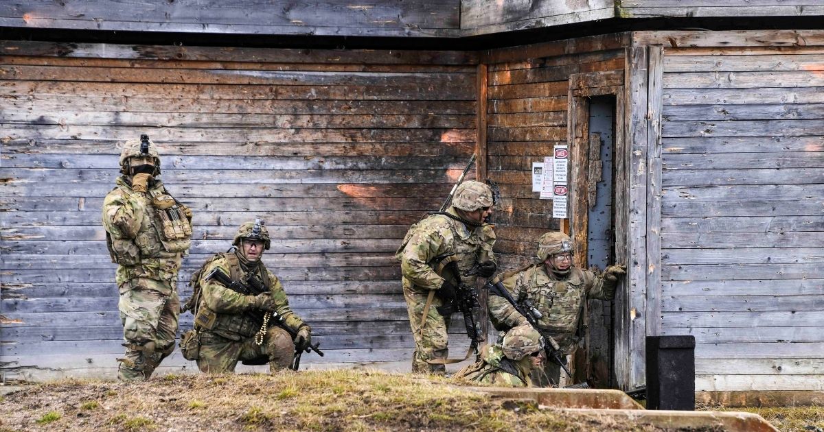 Soldiers participate in a platoon external evaluation at the Grafenwoehr Training Area in Germany on March 15.