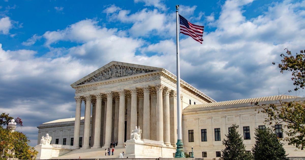 An angular, landscape view of the U.S. Supreme Court building in Washington D.C.