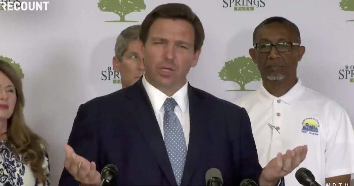 Republican Gov. Ron DeSantis of Florida discusses his opinion on COVID-19 vaccination during a news conference on Friday in Lakeland, Florida.