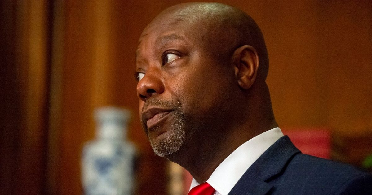 Republican Sen. Tim Scott of South Carolina is seen before a meeting with Judge Amy Coney Barrett, then-President's Donald Trump's nominee for the Supreme Court, in the Mansfield Room of the U.S. Capitol in Washington on Sept. 29.
