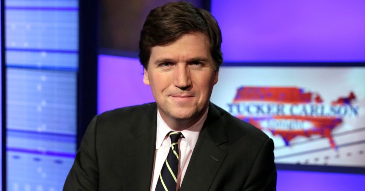 Tucker Carlson, host of "Tucker Carlson Tonight," poses for a photo in a Fox News Channel studio in New York.