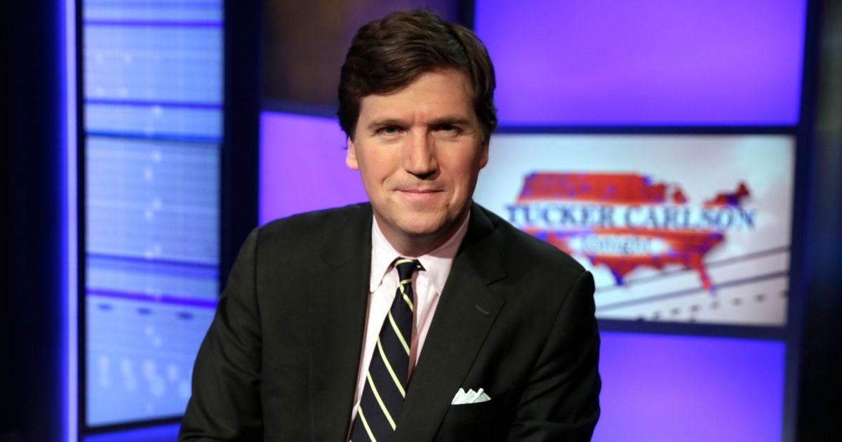 Tucker Carlson poses for a photo in a Fox News studio in New York City on March 2, 2017.