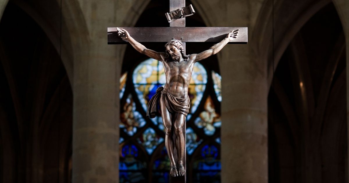 A statue of Jesus Christ on the cross at Saint-Étienne-du-Mont church in Paris.