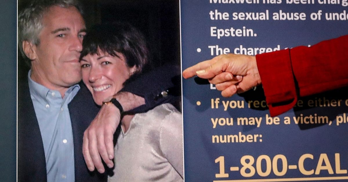 Audrey Strauss, acting U.S. attorney for the Southern District of New York, points to a photo of Jeffrey Epstein and Ghislaine Maxwell during a news conference in New York City on July 2, 2020. Epstein, who died the previous year, and Maxwell have been accused in several sex trafficking criminal cases and civil lawsuits.
