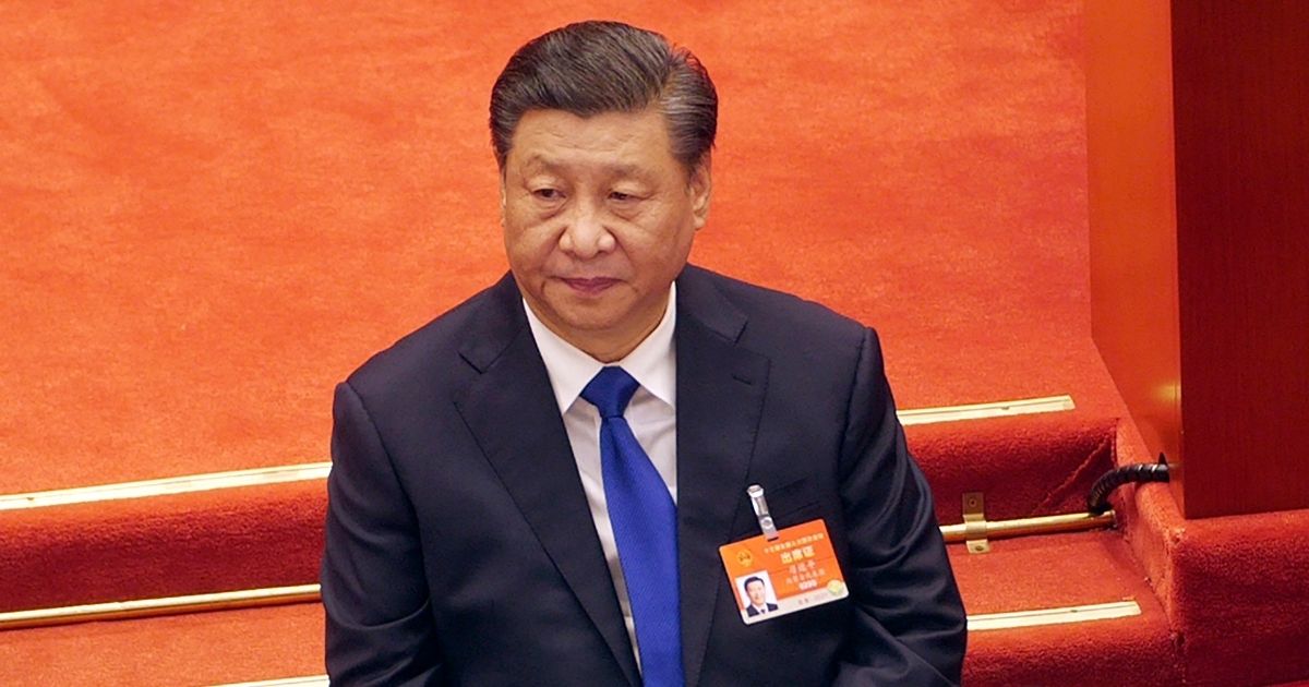Chinese President Xi Jinping attends a plenary session of China's National People's Congress at the Great Hall of the People in Beijing on March 8, 2021.