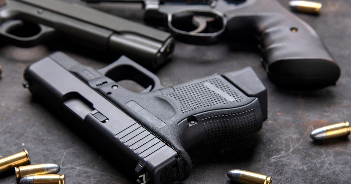 Handguns are seen in this stock image.