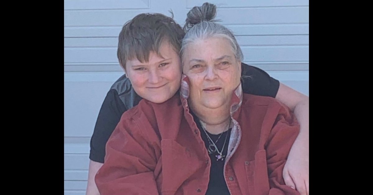 Kaleb with his grandmother, who recently fell down and needed help.