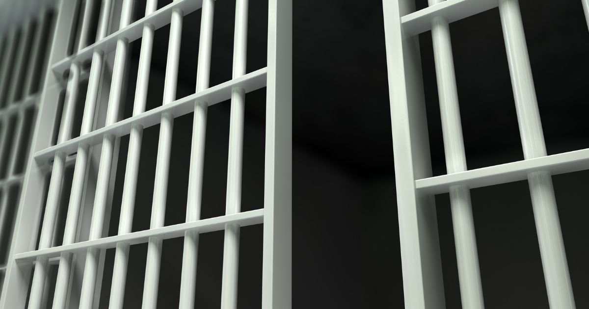 A prison cell is seen in this stock image.