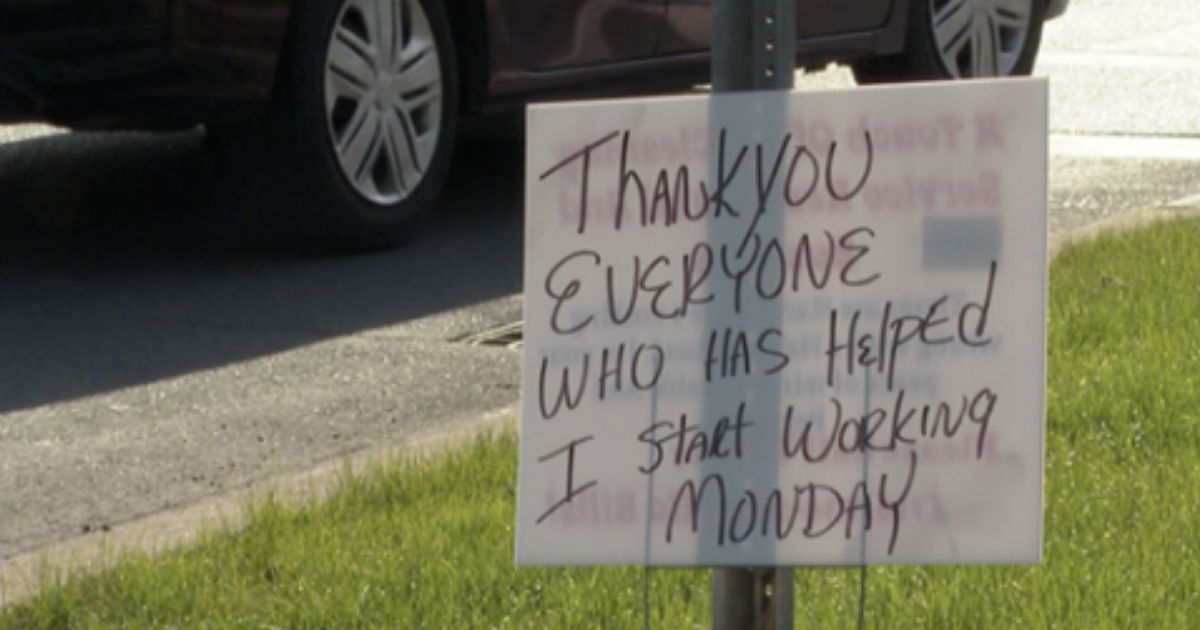 A sign was left on a street corner in Seneca, New York, where a man named Kevin used to stand.