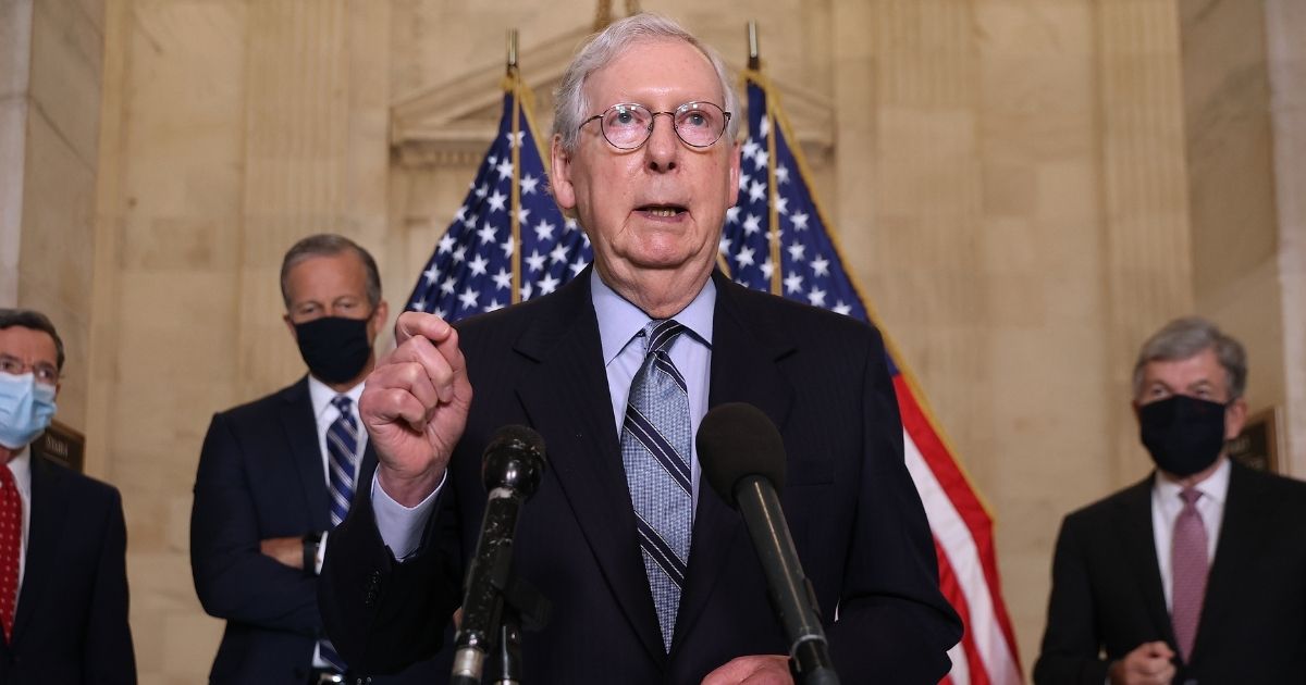 Senate Minority Leader Mitch McConnell talks to reporters following the weekly Senate Republican policy luncheon meeting in the Russell Senate Office Building on Tuesday in Washington, D.C.
