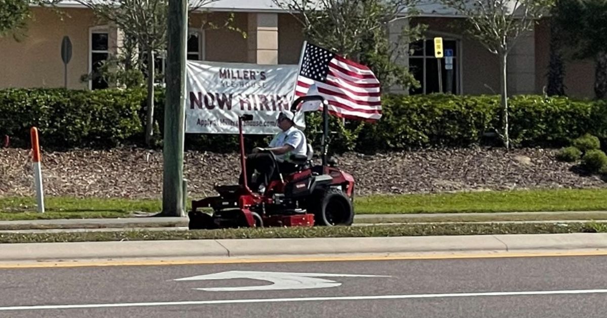 Chip Hawthorne on his riding lawnmower while on his 130-mile journey across Florida to raise money for Habitat for Humanity.