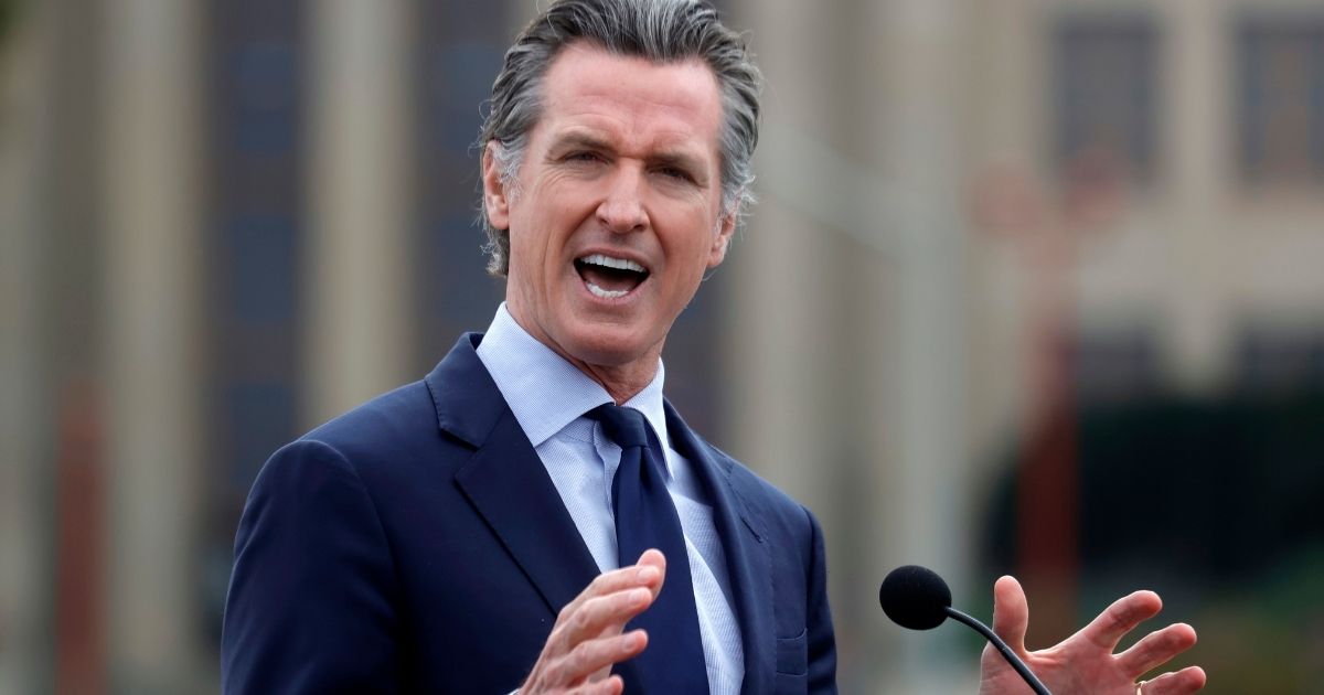 California Gov. Gavin Newsom speaks during a news conference at City College of San Francisco on April 6, 2021, in San Francisco.
