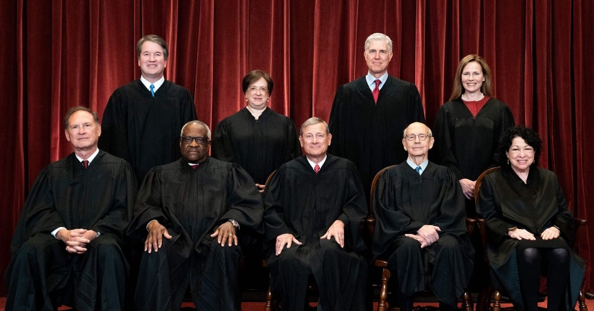 The Supreme Court justices are photographed at the Supreme Court in Washington, D.C., on April 23, 2021.