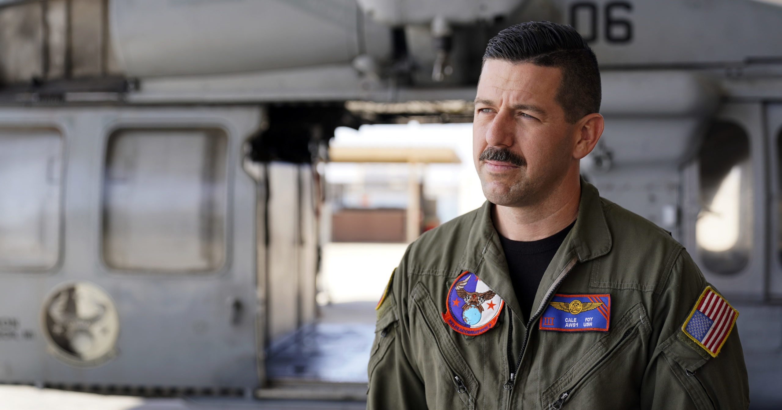 Navy rescue swimmer Cale Foy looks on at Naval Air Station North Island on Tuesday in San Diego.