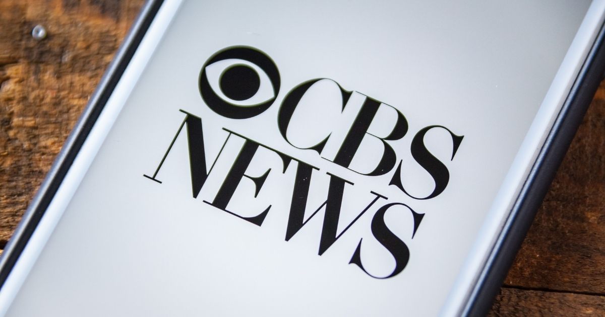 The CBS News app is pictured on a smartphone in the stock image above.