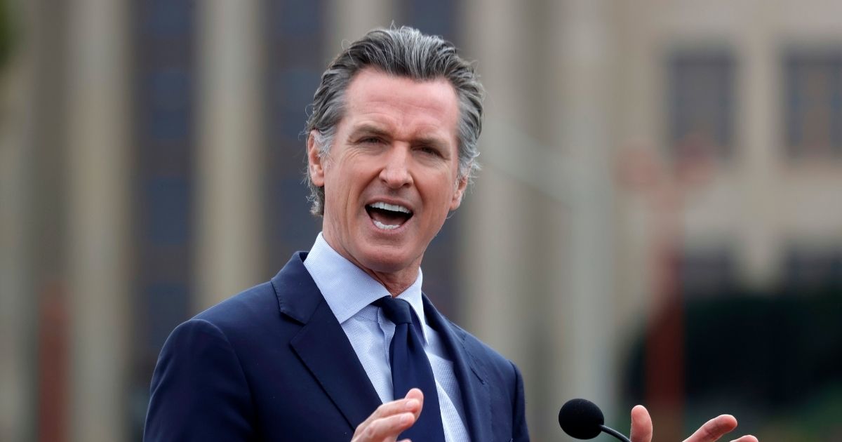 Democratic California Gov. Gavin Newsom speaks during a news conference after touring the vaccination clinic at City College of San Francisco on April 6 in San Francisco.