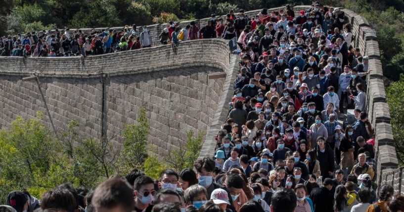 Tourists walk the Great Wall of China