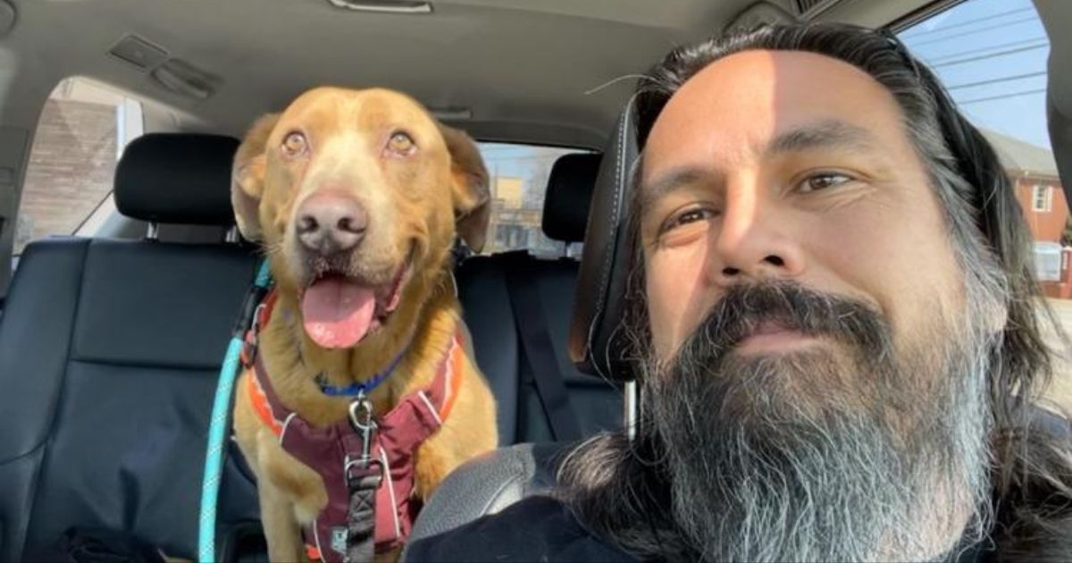 Michael Joy and his dog Sam, who had been missing for over four years but was reunited with his owner thanks to his microchip. (Michael Joy via 10 Tampa Bay / Facebook screen shot)