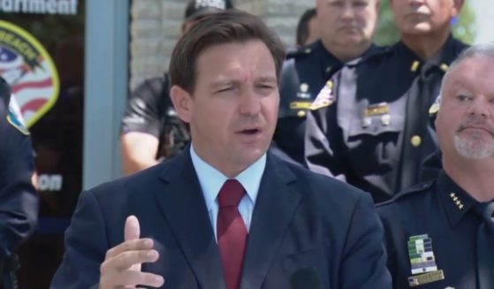 Standing among law enforcement officers, Republican Gov. Ron DeSantis of Florida said Wednesday that the state will provide $1,000 bonuses to all police officers, firefighters and paramedics in the state.