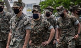 U.S. Marines prepare to receive the Moderna coronavirus vaccine at Camp Hansen in Okinawa, Japan, on April 28, 2021.