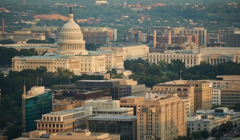 In this stock photo, an aerial view of the U.S. Capitol and the Federal Triangle is depicted in Washington, D.C.
