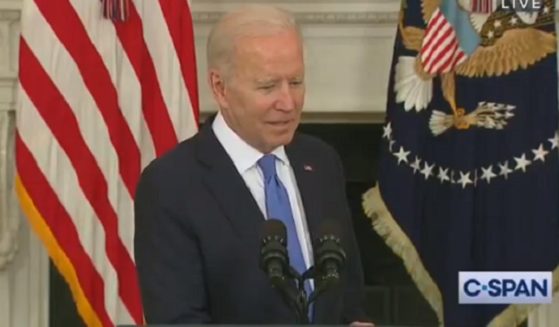 President Joe Biden pauses while answering a question about Senate Minority Leader Mitch McConnell Wednesday at the White House.