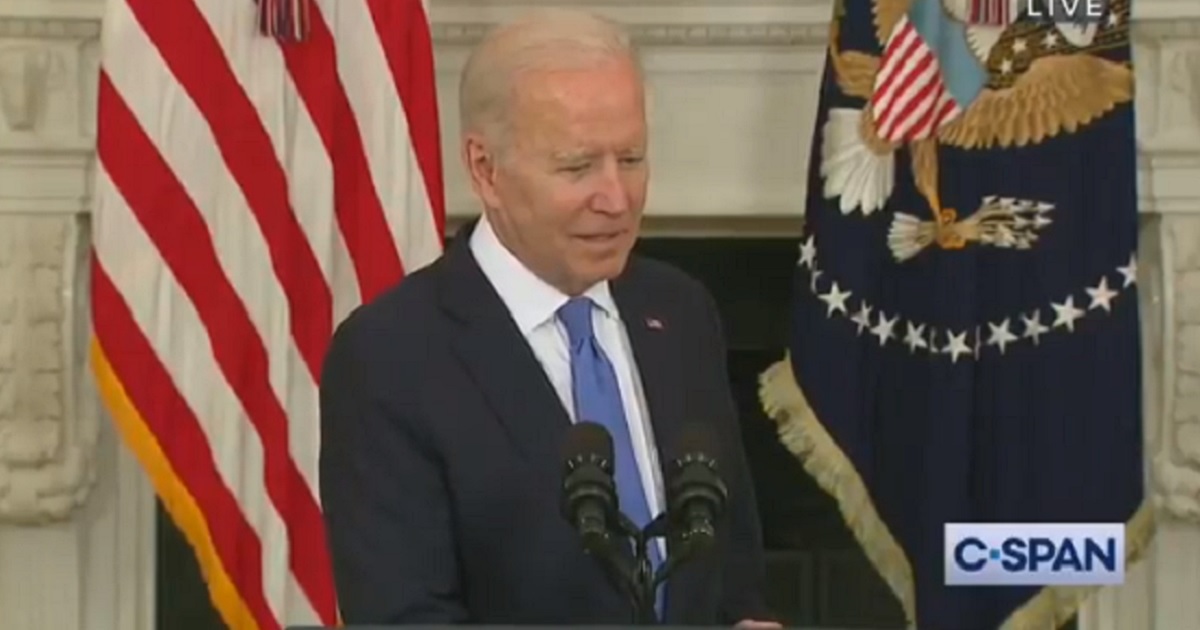 President Joe Biden pauses while answering a question about Senate Minority Leader Mitch McConnell Wednesday at the White House.