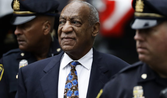 Bill Cosby arrives for his sentencing hearing at the Montgomery County Courthouse on Sept. 24, 2018, in Norristown, Pennsylvania. Prosecutors asked the U.S. Supreme Court to review the decision that overturned Cosby’s conviction. In a petition filed Monday, they wrote that courts should not equate a supposed promise made by a former prosecutor to lifetime immunity.