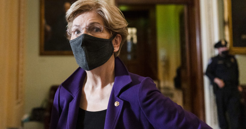 Sen. Elizabeth Warren of Massachusetts speaks to a reporter on Capitol Hill in a Dec. 7 file photo.